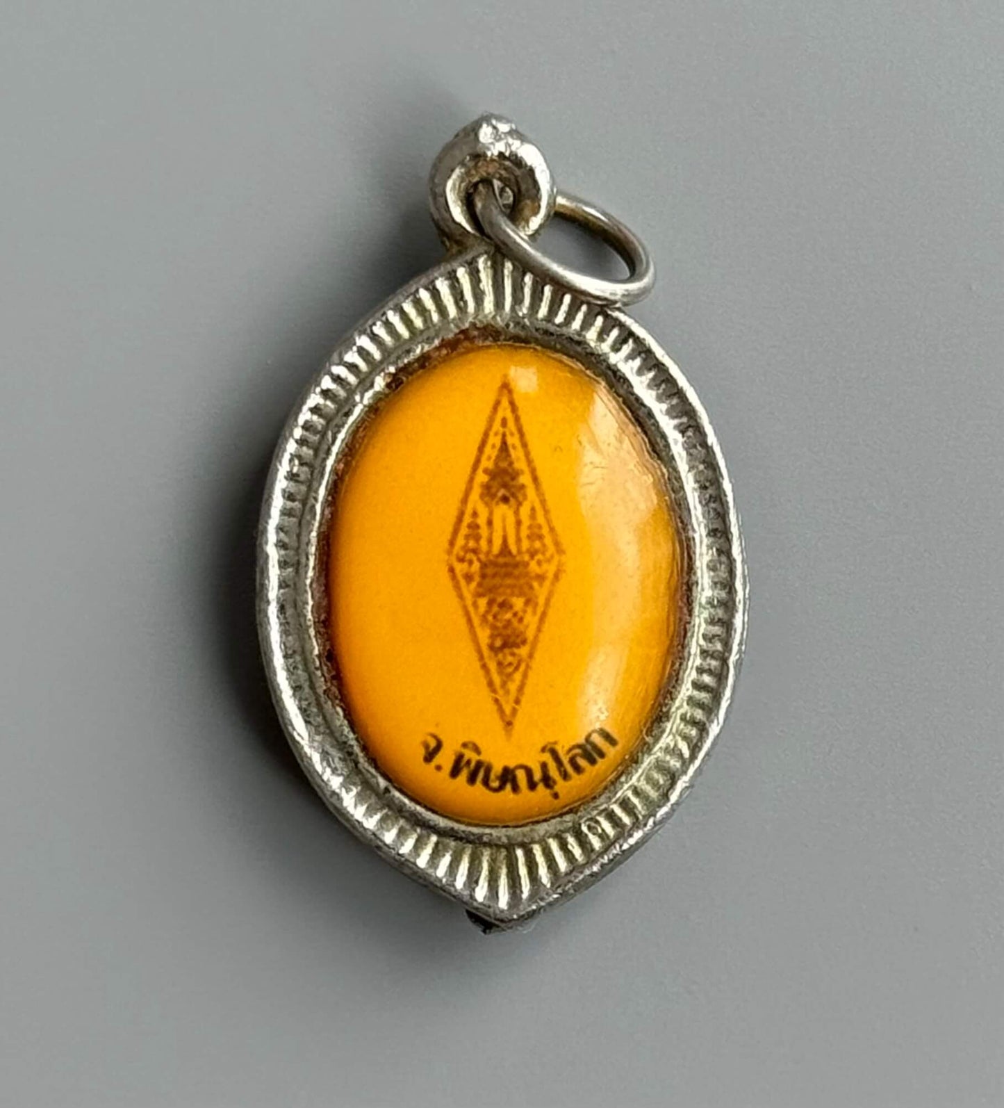 Phra Buddha Chinnarat Encased Amulet