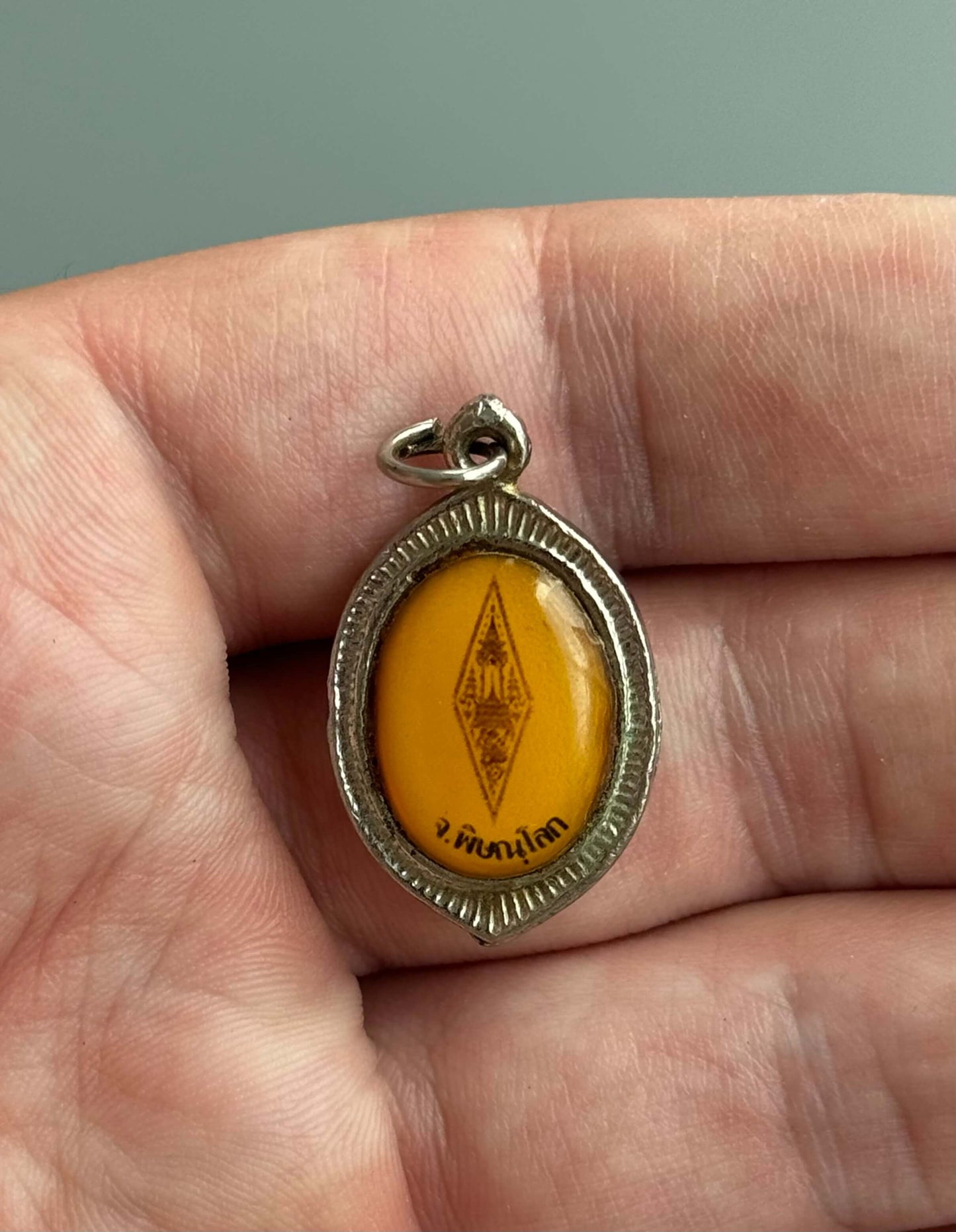 Phra Buddha Chinnarat Encased Amulet