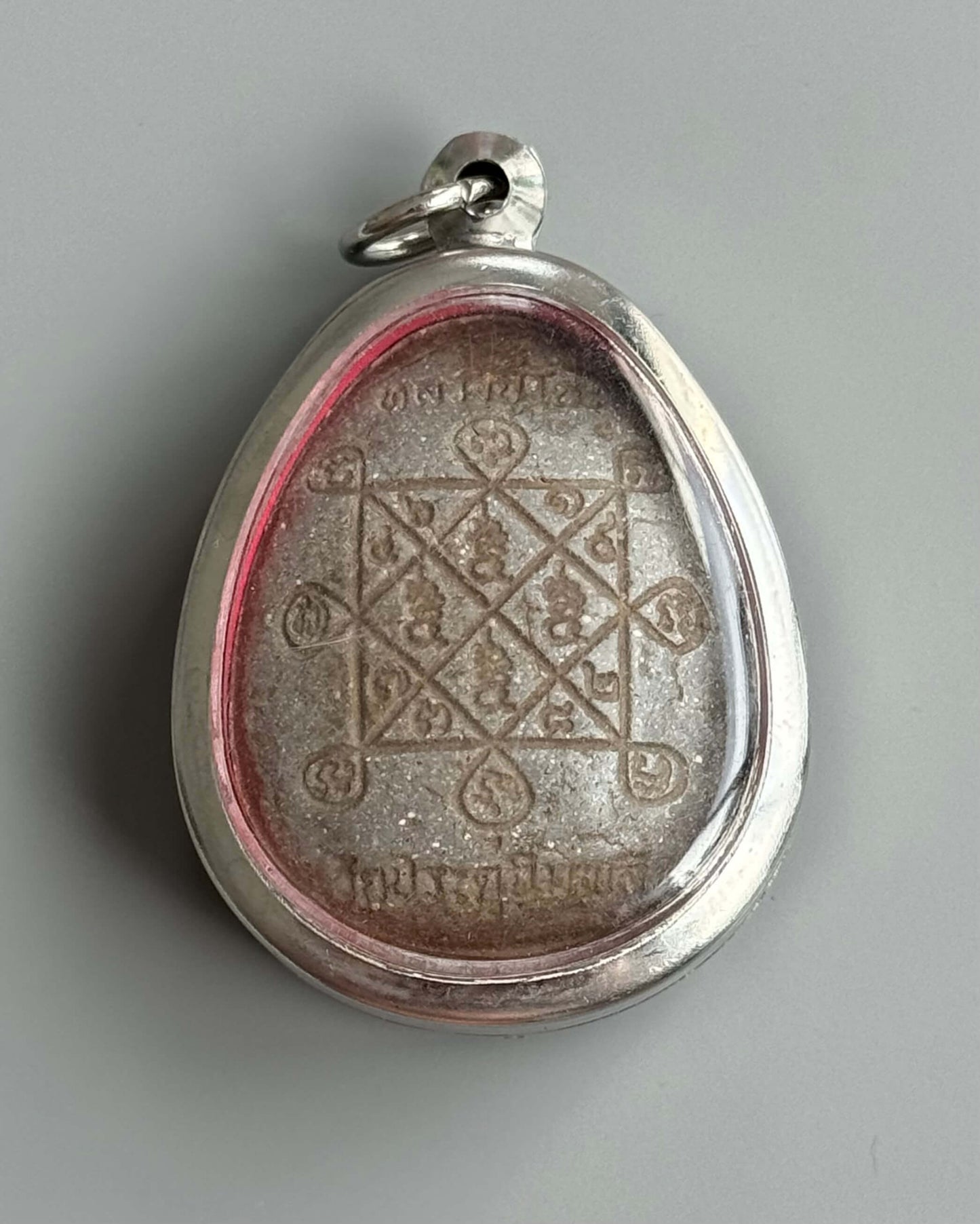 Phra Pid Ta Amulet