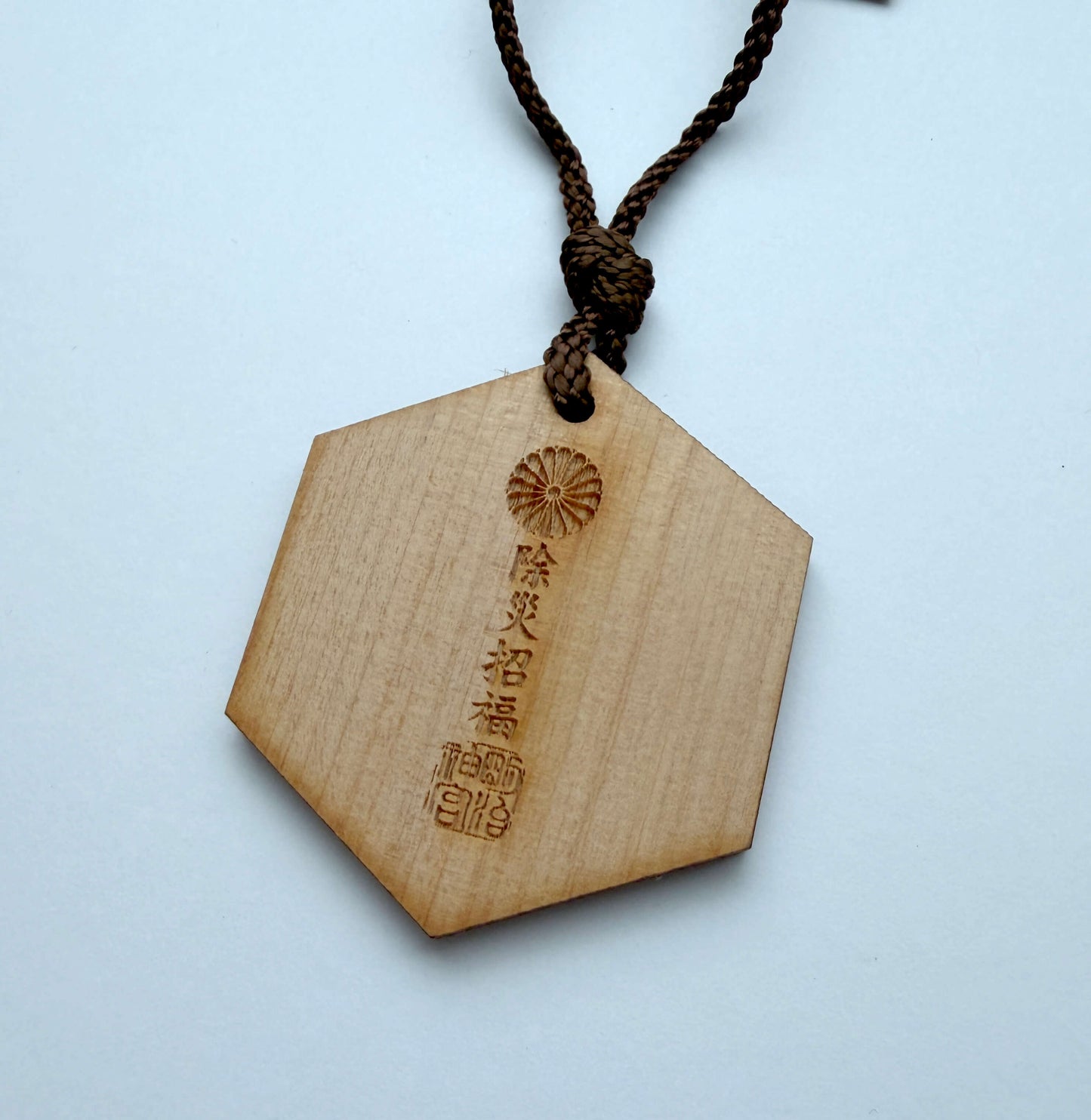 Omamori made from wood of 100-Year Torii Gate