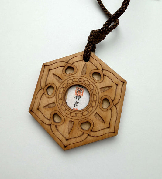 Omamori made from wood of 100-Year Torii Gate